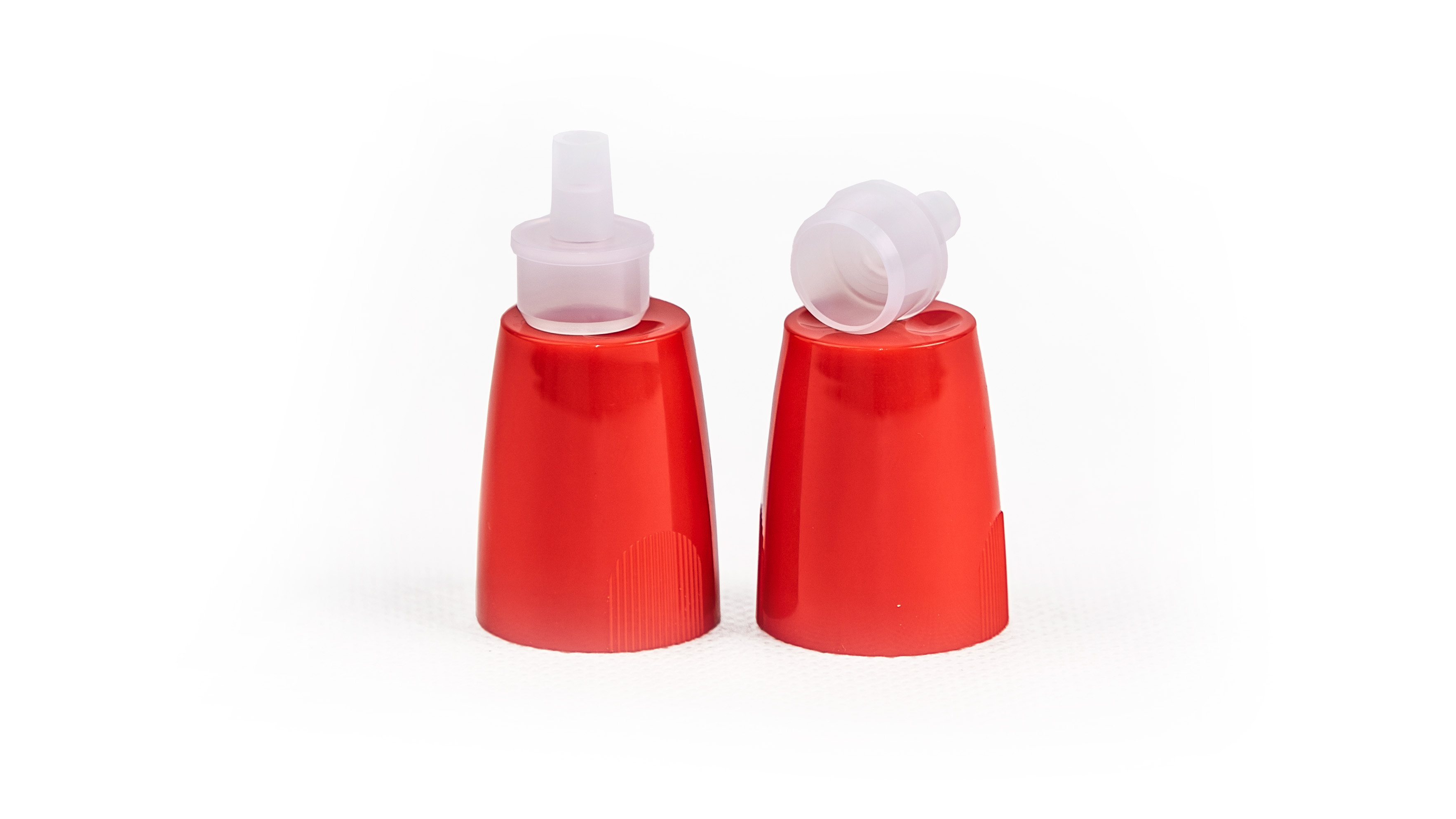 Plastic caps with inserts