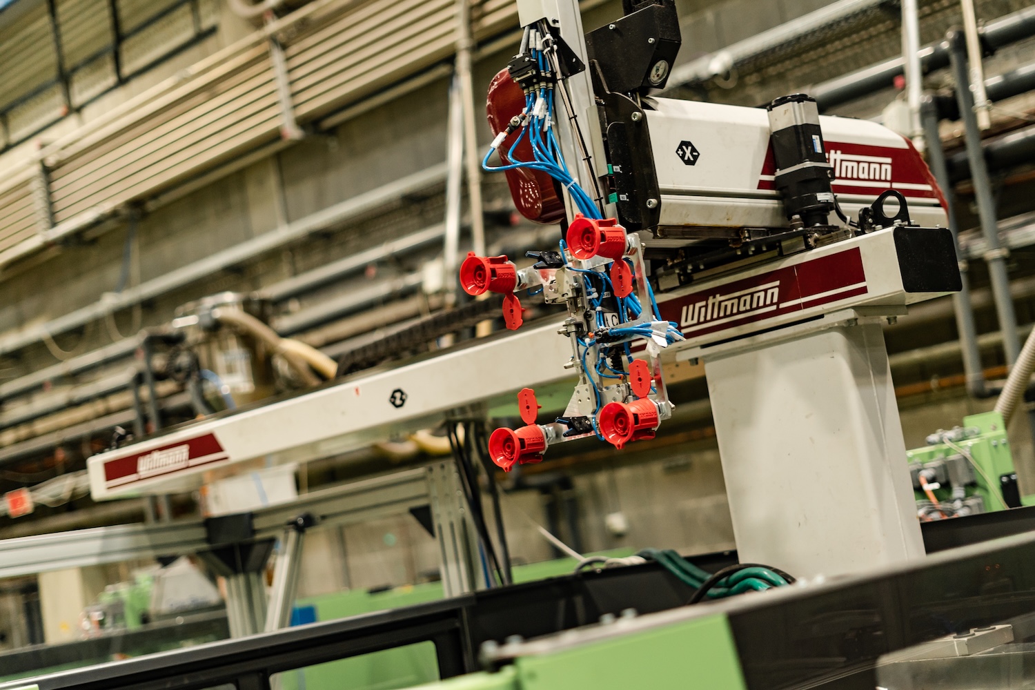 Linear robotic arm for automating packaging and assembly tasks